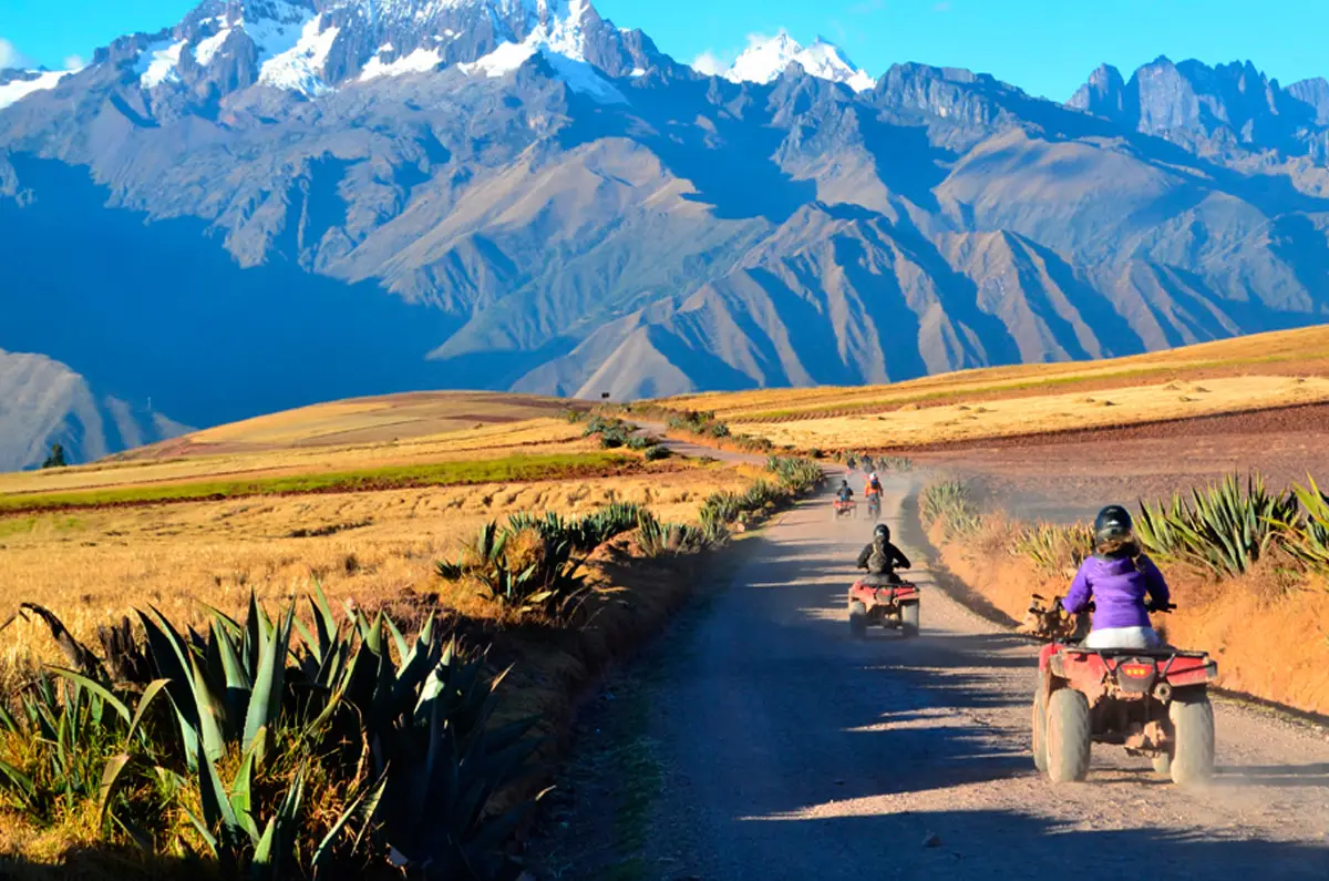 Quad Biking Sacred Valley Snowy Mountains