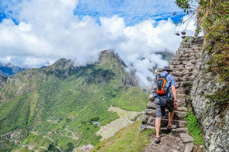 Tourist Climbing Huayna Picchu Stairs